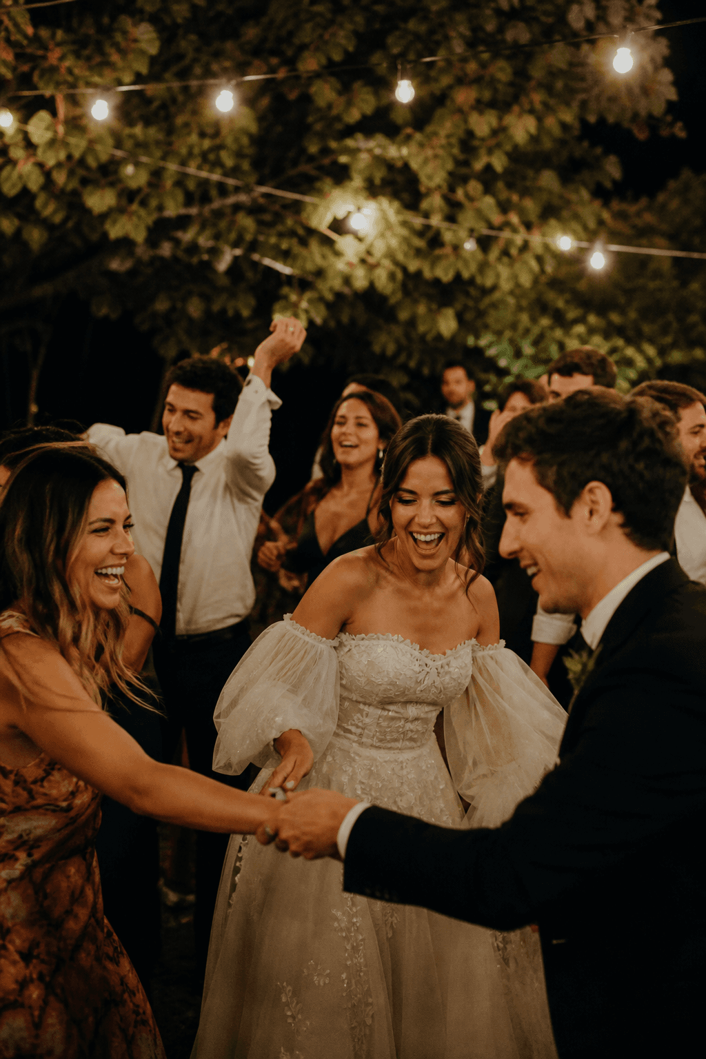 Guests laughing on the dance floor